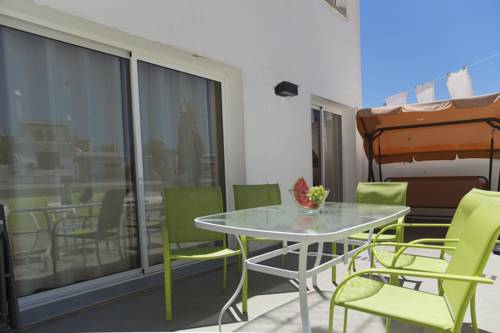 Sitges España super código de descuento booking.com